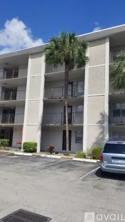 Rent this 1 bed condo on 4899 NW 26th Ct