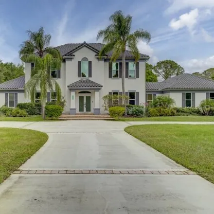 Buy this 4 bed house on 7993 Saddlebrook Dr in Port Saint Lucie, Florida