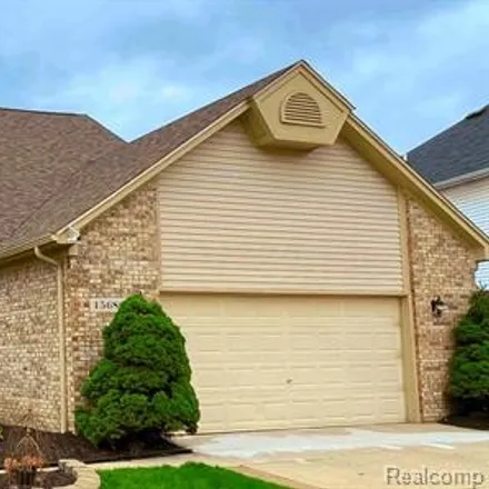 Buy this 4 bed house on 15686 Retreat Drive in Macomb Township, MI 48042