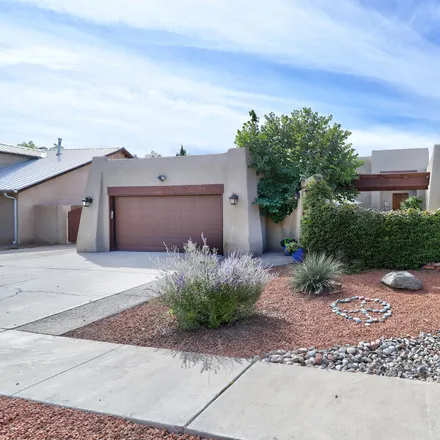 Buy this 4 bed house on 2404 Rozinante Drive Northwest in Albuquerque, NM 87104