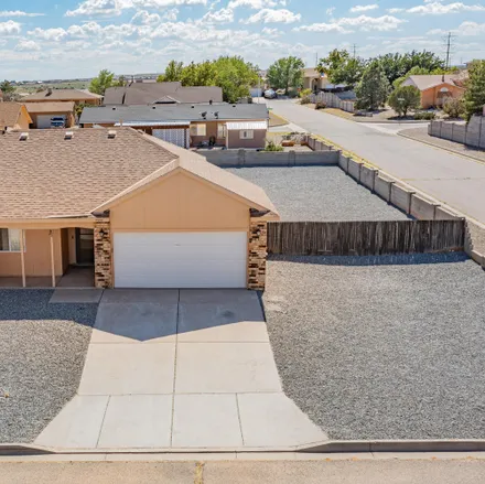 Buy this 3 bed house on 7300 Syr Drive Northeast in Rio Rancho, NM 87144