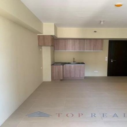 Rent this 1 bed condo on 34th Street in Taguig, 1634