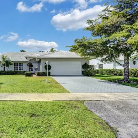 Rent this 3 bed house on Delaire Country Club in 4645 White Cedar Lane, Delray Beach