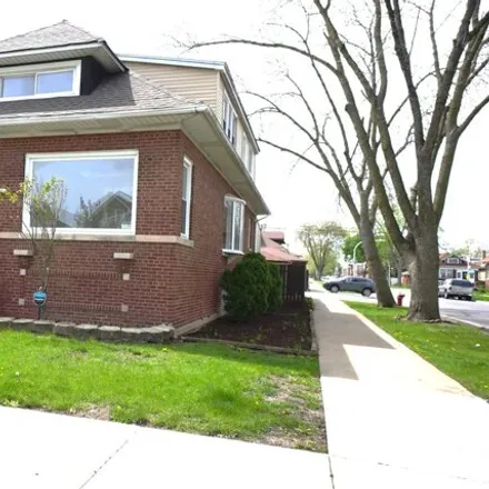 Buy this 4 bed house on 1656 North Parkside Avenue in Chicago, IL 60639