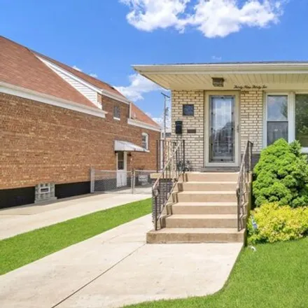 Buy this 3 bed house on 3932 West 59th Place in Chicago, IL 60629