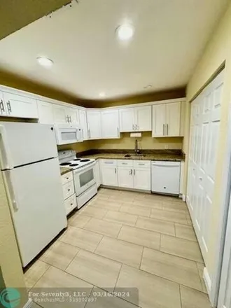 Rent this 2 bed townhouse on 1086 Manor Drive in Palm Springs, FL 33461