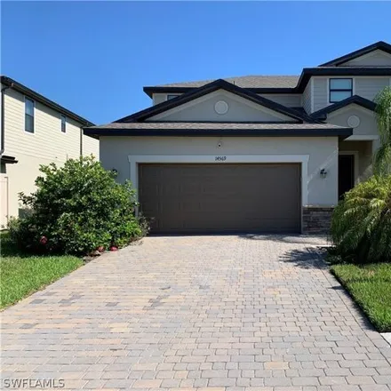 Rent this 4 bed house on 14569 Monrovia Ln in Fort Myers, Florida