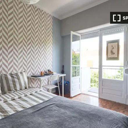 Rent this 7 bed room on Rua Doutor Rafael Duque in 1500-544 Lisbon, Portugal