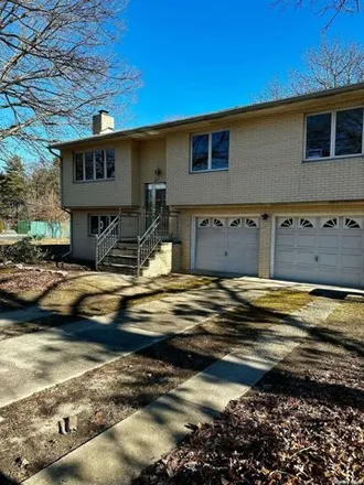 Rent this 4 bed house on 283 Commack Road in Deer Park, NY 11729
