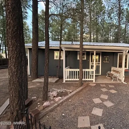 Buy this 1 bed house on 927 Tom's Trail in Lake of the Woods, Navajo County