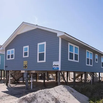 Buy this 3 bed house on 1325 West Beach Drive in Oak Island, Brunswick County