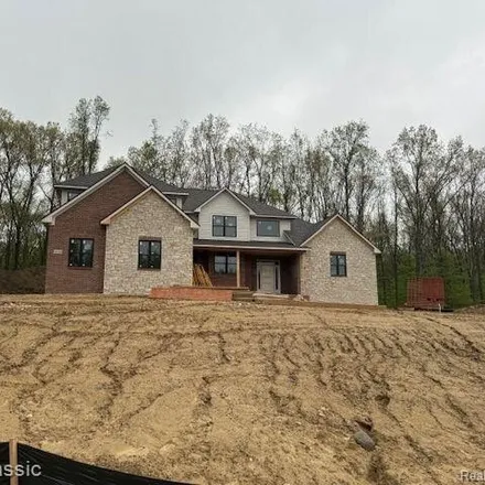 Buy this 5 bed house on 2770 Pine Bluffs Court in Highland Charter Township, MI 48357