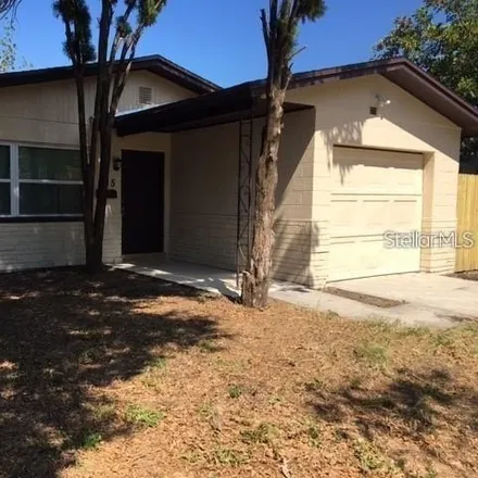 Rent this 3 bed house on 219 Southwest Madison Circle North in Saint Petersburg, FL 33703