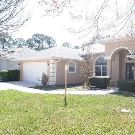 Rent this 3 bed house on 35 Lake Success Drive in Palm Coast, FL 32137