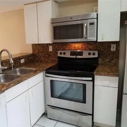 Rent this 2 bed townhouse on 171 Riviera Circle in Weston, FL 33326