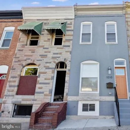 Buy this 3 bed house on 1010 North Patterson Park Avenue in Baltimore, MD 21205