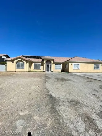 Rent this 4 bed house on 3640 East Judson Avenue in North Las Vegas, NV 89030