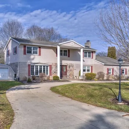 Buy this 6 bed house on 5071 Brookside Drive in Summit Township, MI 49203