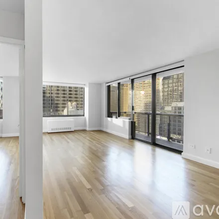 Image 1 - West 48th St 2nd Ave, Unit 31M - Apartment for rent