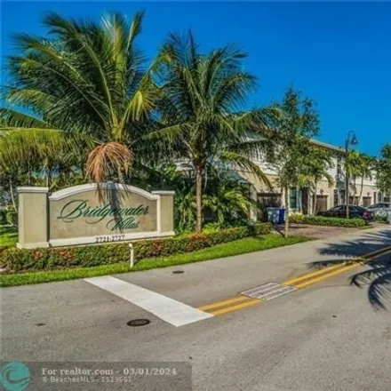 Rent this 3 bed townhouse on Northeast 14th Street Causeway in Country Club Isles, Pompano Beach