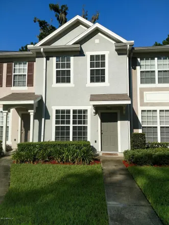 Rent this 2 bed townhouse on 3510 Twisted Tree Lane in Jacksonville, FL 32216