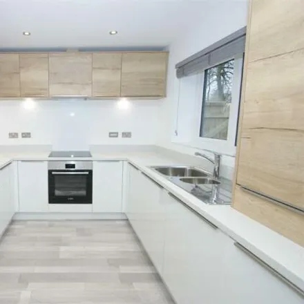 Rent this 4 bed townhouse on Victoria Gardens in Leeds, LS6 1FH