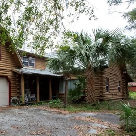 Buy this 4 bed house on 18504 Lakeshore Drive in Lutz, FL 33549