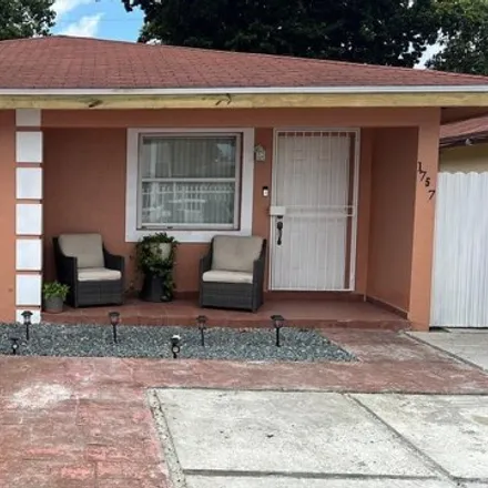 Buy this 3 bed house on 1757 Northwest 66th Street in Liberty Square, Miami