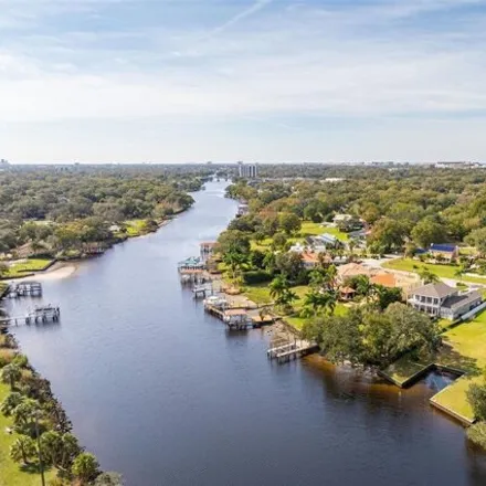 Buy this 7 bed house on North River Shore Drive in Tampa, FL 33603