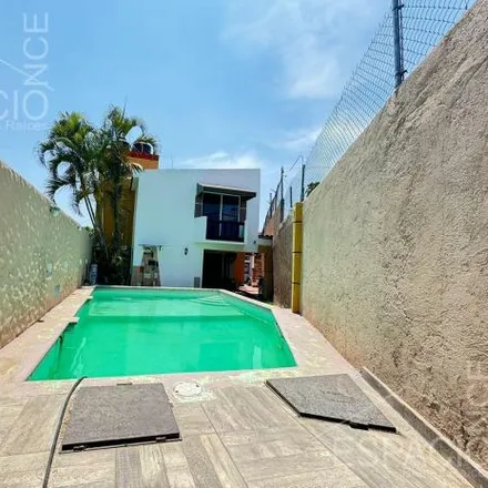 Rent this 5 bed house on Calle Azucenas in Quintana Roo, 62070 San Miguel Acapantzingo