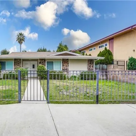 Rent this 4 bed house on 12594 Chandler Boulevard in Los Angeles, CA 91607