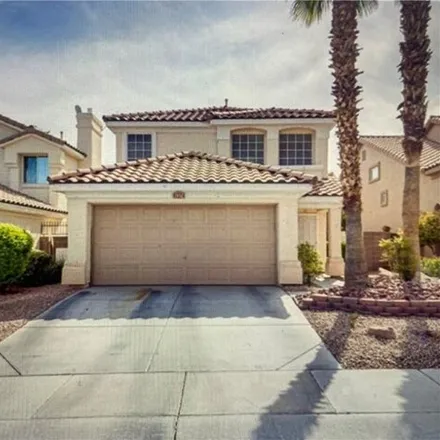 Rent this 4 bed house on 1936 Sondrio Drive in Las Vegas, NV 89134
