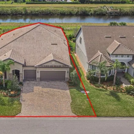 Buy this 5 bed house on 768 Southeast Villandry Way in Port Saint Lucie, FL 34984