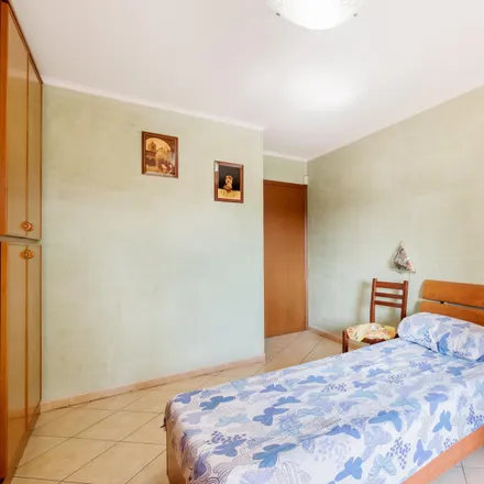 Rent this 4 bed room on Via Tullio Garbari in 00126 Rome RM, Italy