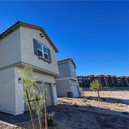 Buy this 3 bed loft on 5991 Bonita Canyon Avenue in Clark County, NV 89142