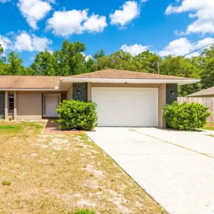 Buy this 2 bed house on 5453 Pinehurst Drive in Spring Hill, FL 34606