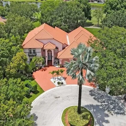 Buy this 6 bed house on Eagle Trace Golf Club in 1111 Eagle Trace Boulevard West, Coral Springs
