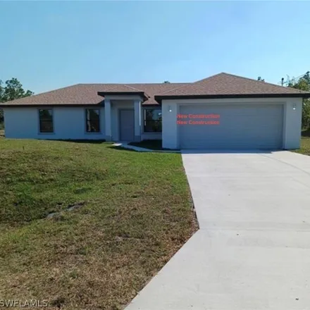Buy this 4 bed house on 740 Foxtail St E in Lehigh Acres, Florida