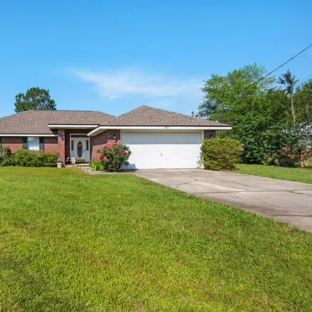 Buy this 4 bed house on 8201 Hazelgrove Court in Navarre, FL 32566