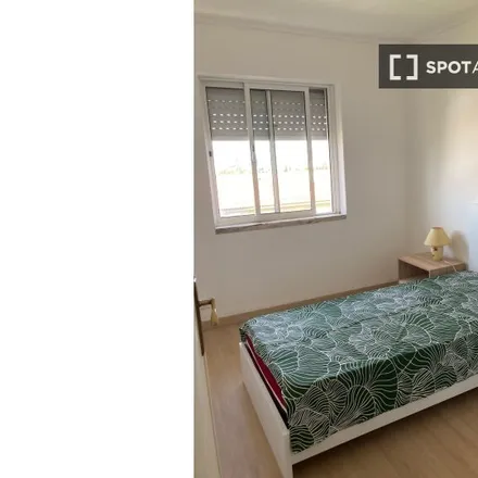 Rent this 2 bed room on Rua Cidade de Benguela LT 291 in 1800-071 Lisbon, Portugal
