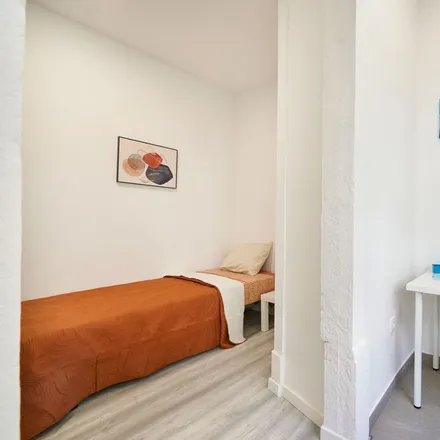 Rent this 6 bed room on Rua Carvalho Araújo