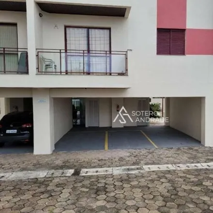 Rent this 2 bed apartment on Avenida Doutor Altino Arantes in Centro, Caraguatatuba - SP