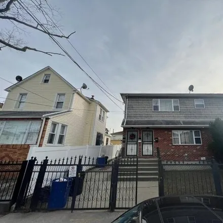 Buy this 4 bed house on 174-48 127th Avenue in New York, NY 11434