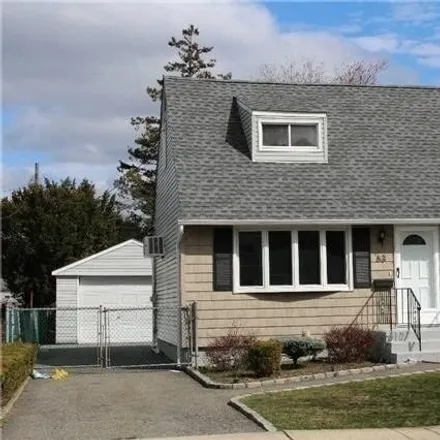 Rent this 4 bed house on 65 Cliff Drive in Hicksville, NY 11801