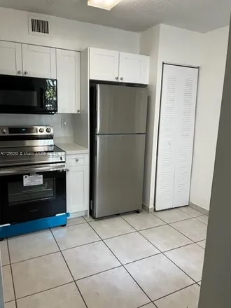 Rent this 2 bed condo on 14020 Southwest 90th Terrace in Miami-Dade County, FL 33186
