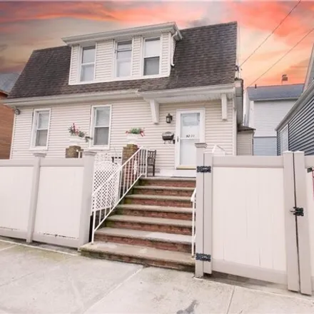 Buy this 3 bed house on 92-11 Holland Avenue in New York, NY 11693