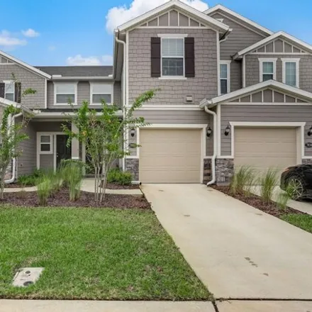 Buy this 3 bed townhouse on Merchants Way in Jacksonville, FL 32222