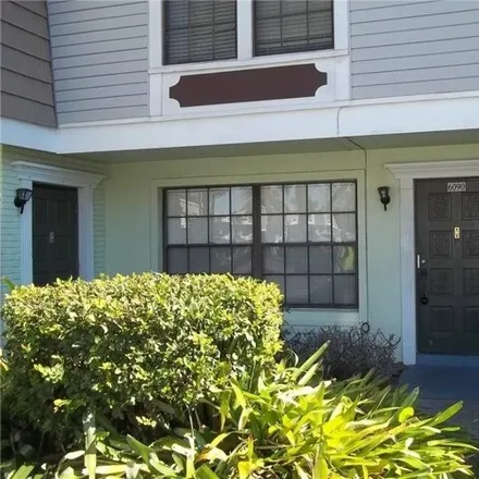 Rent this 2 bed townhouse on 6052 Village Circle South in Orlando, FL 32822