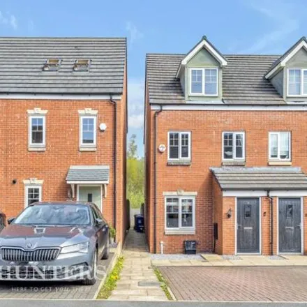 Buy this 4 bed townhouse on Oakley Way in Wardle, OL12 9EQ