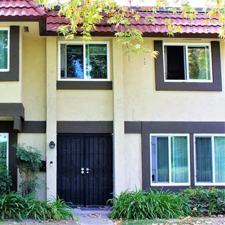 Buy this 4 bed townhouse on 1431 North Shade Tree Lane in Anaheim, CA 92801